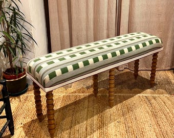 Christopher Farr Cloth bespoke upholstered bench in “Lost and Found” fabric by Kit Kemp with turned bobbin legs