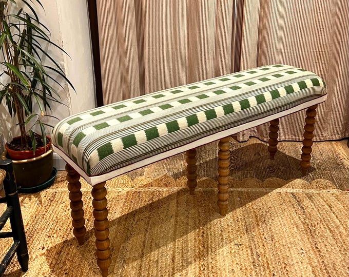 Christopher Farr Cloth bespoke upholstered bench in “Lost and Found” fabric by Kit Kemp with turned bobbin legs