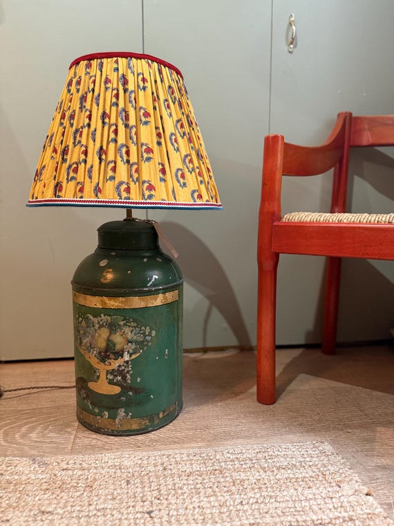 Large green 19th Century toleware lamp with traditional brass fittings.