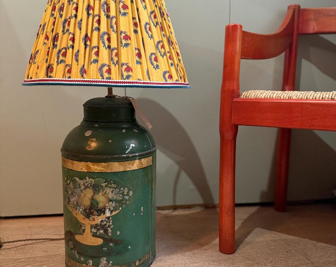 Large green 19th Century toleware lamp with traditional brass fittings.