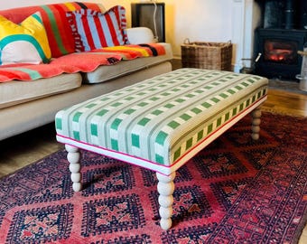 Bespoke Christopher Farr Cloth piped ottoman footstool in Lost and Found fabric by Kit Kemp and turned bobbin style legs