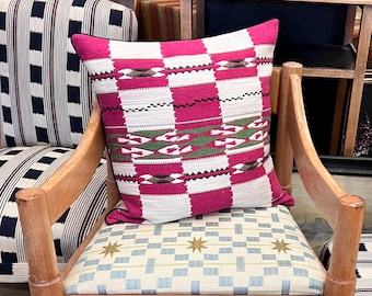 Handmade piped cushions in Christopher Farr Cloth Chubby Check by Kit Kemp