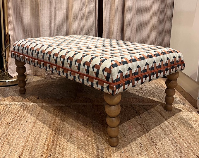 Bespoke Kirkby Design Piccadilly Ottoman footstool in custom sizes and a choice of contrasting piping and turned legs