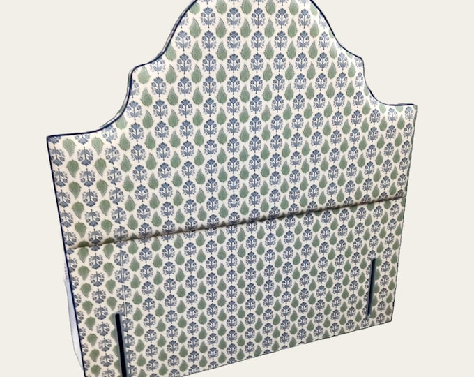 Bespoke upholstered floor-standing piped headboard, in a choice of fabrics, shapes and bed sizes.