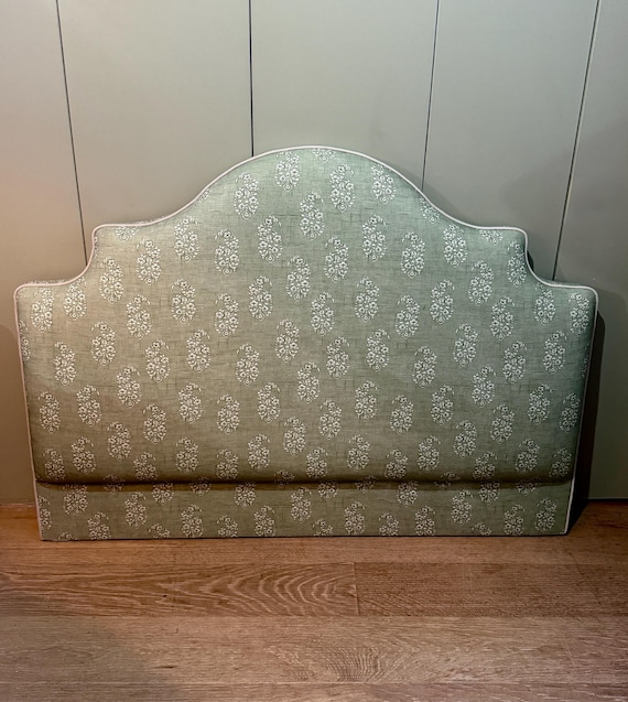 Bespoke upholstered headboard in a range of fabrics with piping