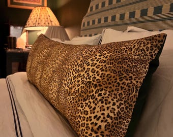 Large leopard print bolster cushions backed with green velvet (two available)