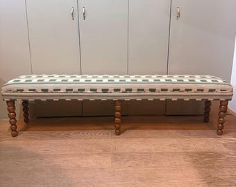 Christopher Farr Cloth bespoke upholstered bench in “Lost and Found” fabric by Kit Kemp with turned bobbin legs