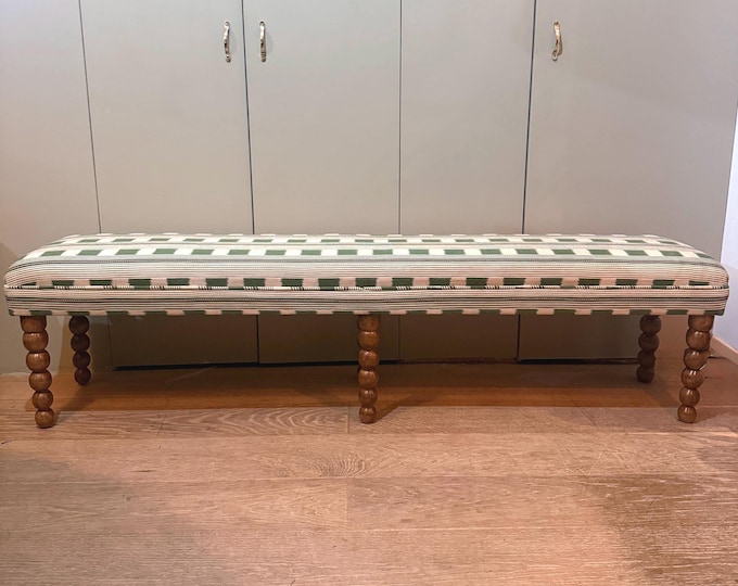 Christopher Farr Cloth bespoke upholstered bench in “Lost and Found” fabric by Kit Kemp with turned bobbin legs