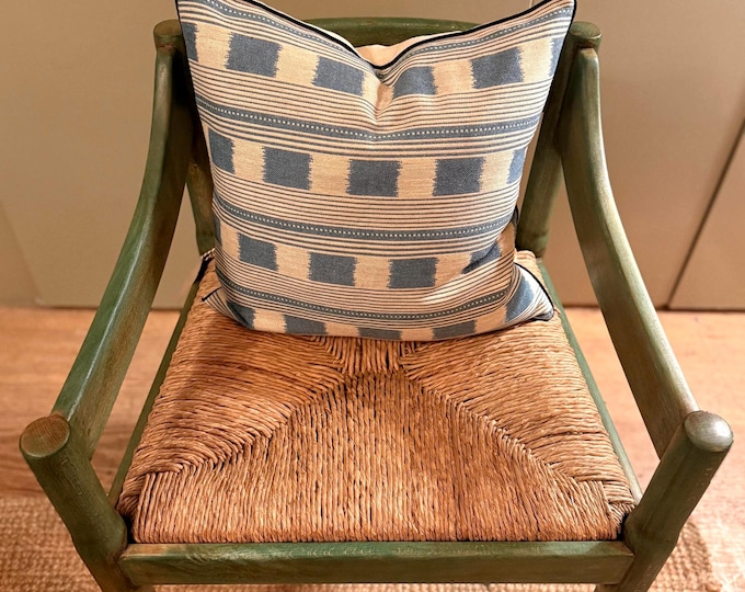 Handmade piped cushions in Christopher Farr Cloth Lost and Found by Kit Kemp