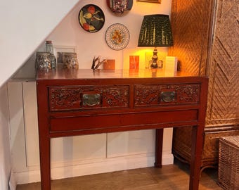 Stunning vintage oriental burnt orange lacquered console table with two drawers