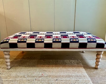 Bespoke Christopher Farr Cloth Ottoman footstool in custom sizes and a upholstered in Chubby Check with turned bobbin or bamboo style legs