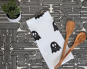 Toalla de cocina con estampado de fantasmas y saco de harina