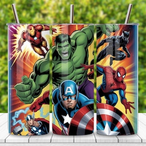 May include: A set of three stainless steel tumblers featuring colorful illustrations of Marvel superheroes, including Iron Man, Hulk, Captain America, Spider-Man, Thor, and Black Panther. Each tumbler has a silver straw and a lid.