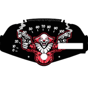 May include: A black and white speedometer gauge with a red and white clown holding two guns. The clown is smiling with a sinister look. The gauge reads from 0 to 110. The text "WWW.FURYFACEPLATES.COM" is at the top of the gauge.