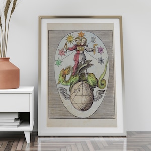 May include: An antique illustration depicting a two-headed figure riding a winged dragon. The figure holds a compass and a set square, and is surrounded by stars and planets. The text "REBIS" is visible on the figure's chest.