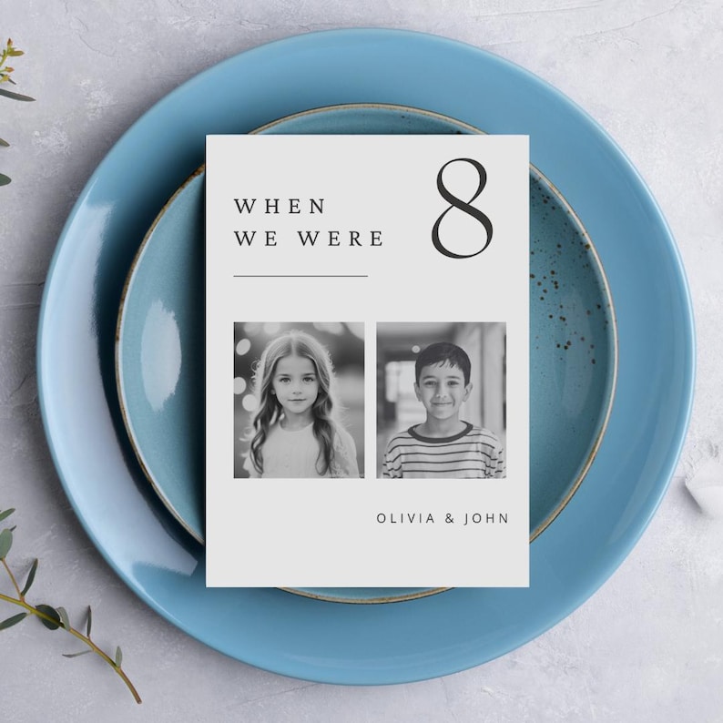 May include: A white card with black text that reads "When We Were" and the number "8". There are two black and white photos of children, a girl and a boy, and the text "Olivia & John" at the bottom.