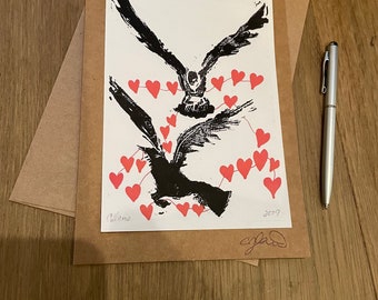 Romantic ravens flying holding hearts crow art card by crow baby press