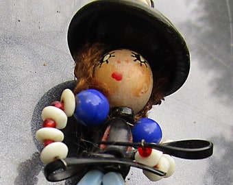 Cowboy Brooch:  RARE Goucho Cowboy Brooch - glass, wood, beads and a serious curly hairdo