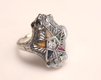 1922 OES Ring:  18k White Gold Filigree, set with true round cut DIAMOND