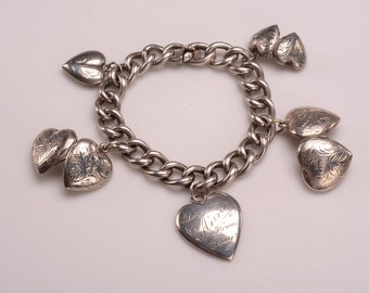 Silver Charm Bracelet made of both HEART CHARMS and Heart LOCKETS - all fine vintage condition