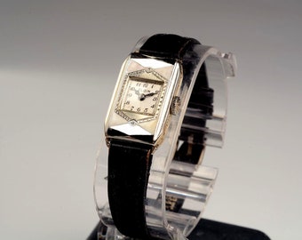 Elgin Lady's Art Deco Wristwatch:  1928 - 14k Gold Filled, Geometic Face with machine engraving, and black and white enamel