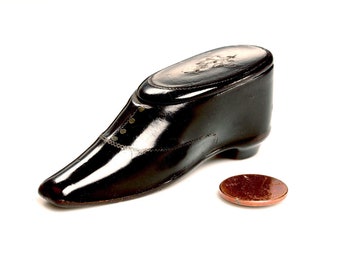 Antique Snuff Box, shoe shape:  papier mache, gloss black enamel, crimped silver wire, silver nail heads, mother of pearl flowers