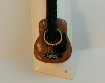Wood Colored Acoustic Guitar  Mezuzah - Black Neck