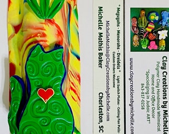 Cat Lime Green Silhouette on a yellow, green, red, and blue Polymer Clay Mezuzah Case