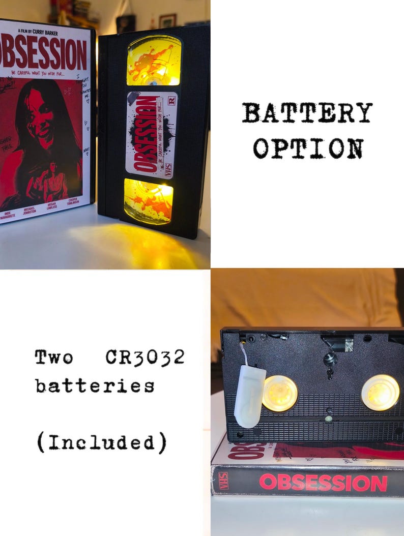 May include: A black VHS tape modified into a lamp with internal yellow lights, featuring an Obsession movie label. The unit includes a battery pack for two CR3032 batteries. The text BATTERY OPTION and Two CR3032 batteries (Included) is visible.