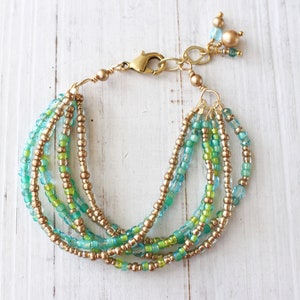 Aqua and gold multi strand bracelet