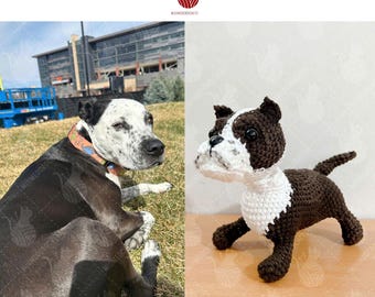 May include: A crocheted brown and white dog figurine. The handmade dog has a white muzzle and chest, with brown ears, head, and body. The dog is posed on a wooden surface.