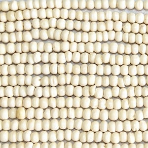6x4mm Off White Water Buffalo Bone Rondelle Beads - 15 Inch Stand (AW31)