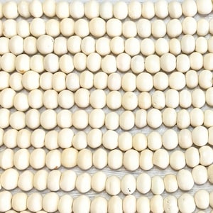 10x8mm Off White Water Buffalo Bone Rondelle Beads - 15 Inch Stand (AW25)