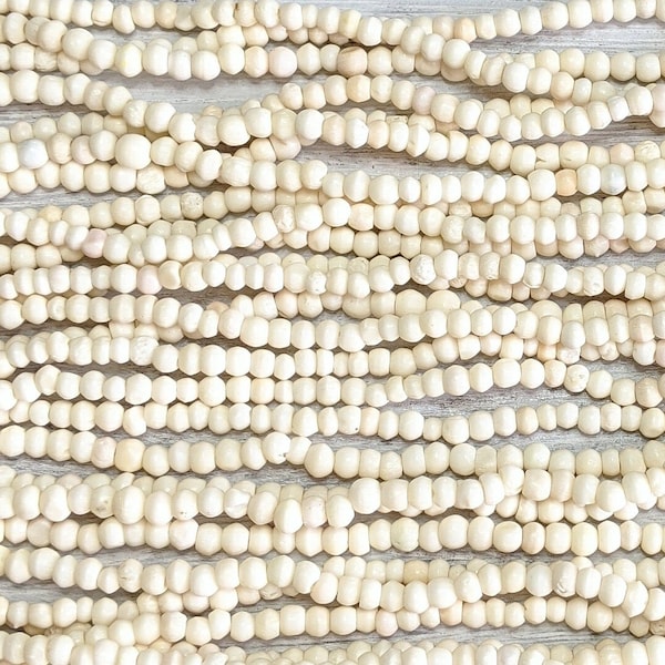4x3mm Off White Water Buffalo Bone Rondelle Beads - 15 Inch Stand (AW34)