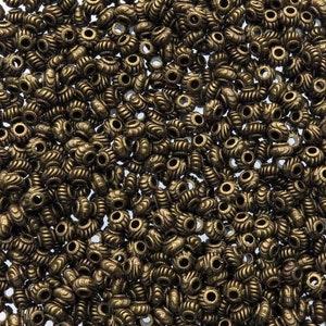Cuentas redondas de aleación de latón antiguo, con orificio de 2 mm de diámetro interior, 6 x 4 mm - Cantidad: 20 (MB352)