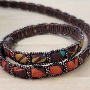 12 x 4 mm Marokko-polyester geweven stoffen sieradenkoord - per voet verkocht (12X4CORD4)