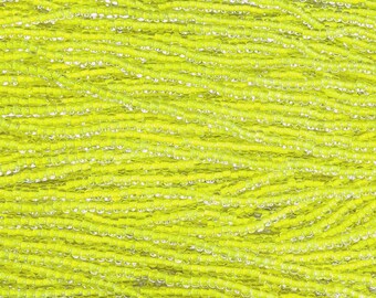 6/0 Transparent Crystal Yellow Lined Glow in the Dark UV Black Light Reactive Czech Glass Seed Bead Strand (6BW157)