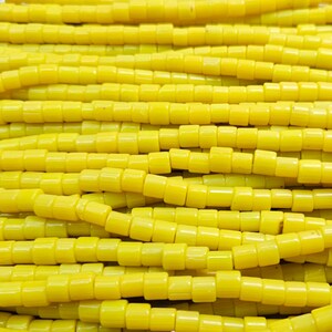 Perline in tubo di vetro giallo - Misura 6 x 5 mm (foro 1,80 mm) - Filo da 16 pollici (IND03)