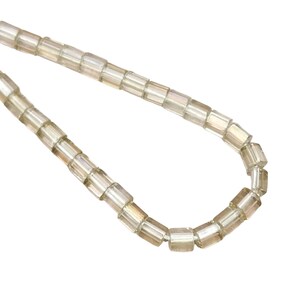 May include: A strand of clear glass beads with a slightly iridescent finish. The beads are square shaped and have a faceted design.