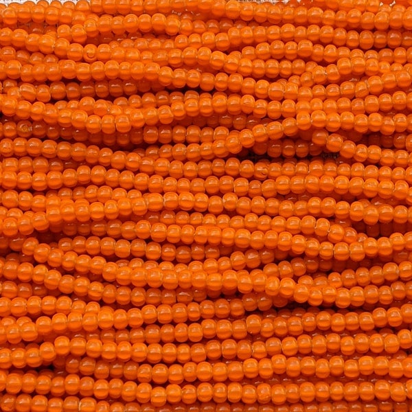 6/0 Orange Cornelian Star Czech Glass Seed Bead Strand (6BW196)