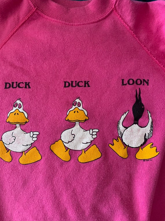 Vintage 90s funny Duck Duck Loon pink graphic swea