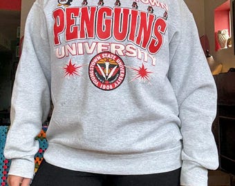 Camiseta de cuello redondo gris jaspeado de los Penguins de la Universidad Estatal de Youngstown, años 90, estilo universitario.