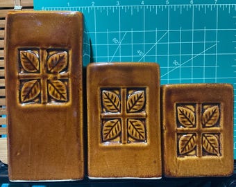 MCM brown candle holders with leaf motif set of 3