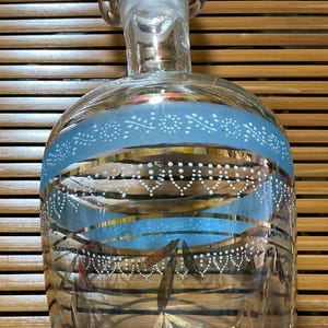 Hand blown glass decanter with glass stopper