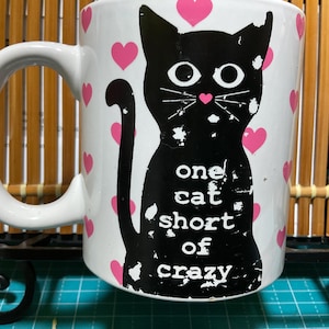 Super large coffee mugs “one cat short of crazy”