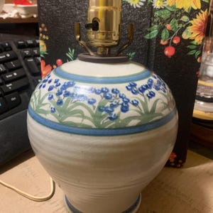 Vintage studio pottery lamp with blue flowers
