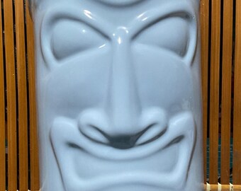 Light blue TIKI coin bank