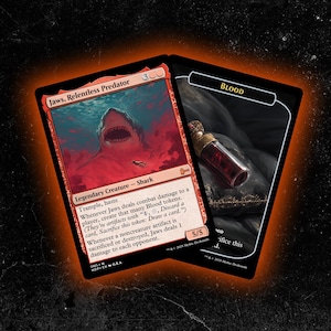 May include: Two Magic: The Gathering cards. One card features a shark illustration with the text "Jaws, Relentless Predator." The other card has a vial of blood and the word "BLOOD." Both cards have a black border and are set against a dark background.