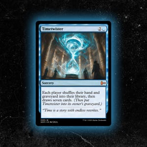 May include: A blue Timetwister card featuring an hourglass design with a swirling blue light effect. The card text describes a sorcery spell. The card has a blue border and the text "Time is a story with endless rewrites."