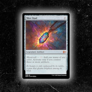 May include: A Mox Opal card featuring a colorful, gem-like pendant on a chain. The card is labeled "Legendary Artifact" with text describing its abilities. The background shows a stone texture.